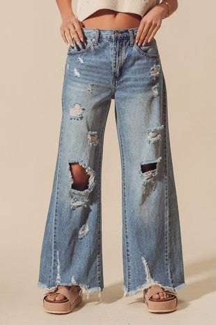 Mid Rise Wide Fit Destructed and Distressed Jeans